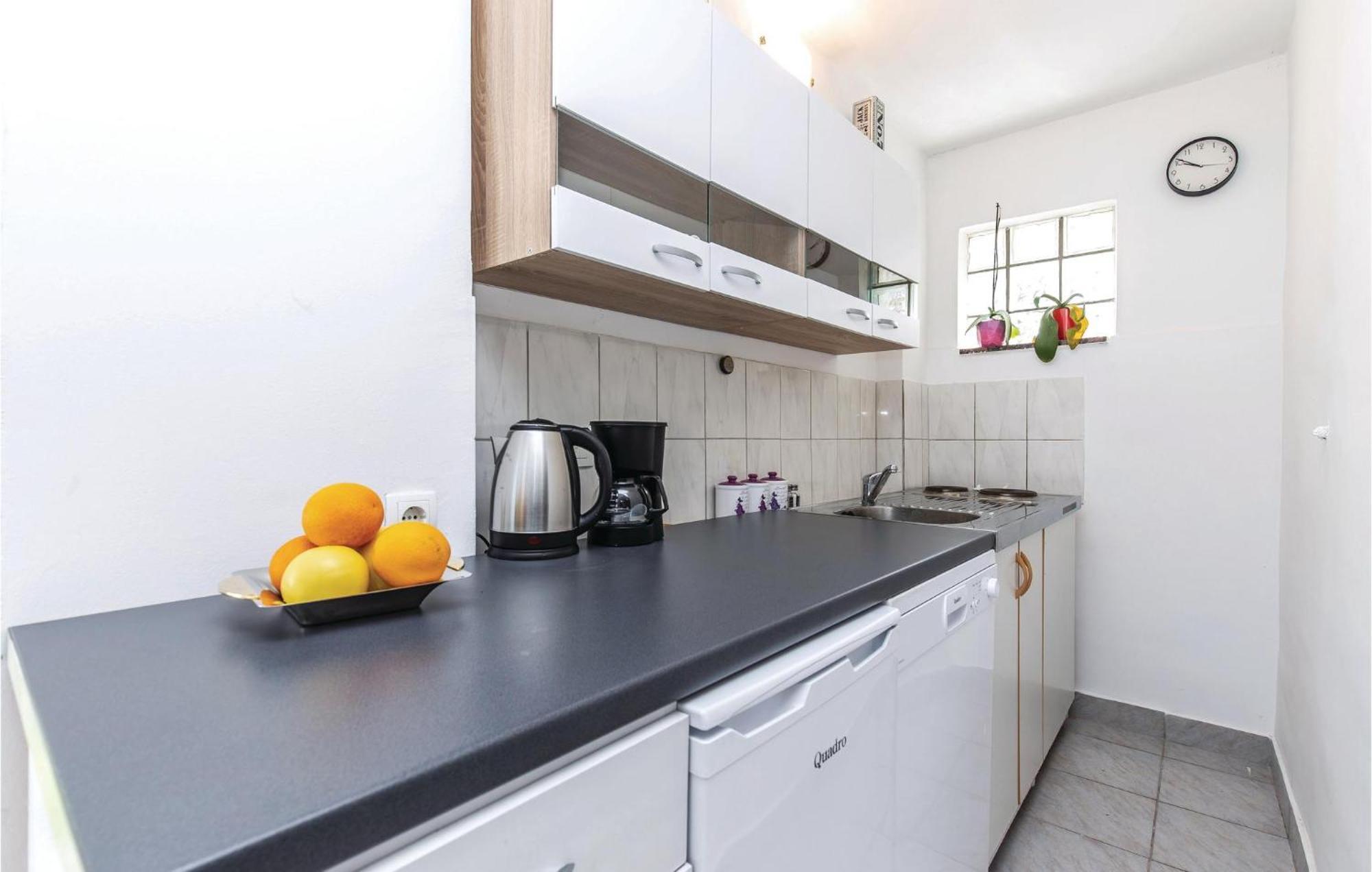 Stunning Apartment In Kostrena With Kitchen Extérieur photo